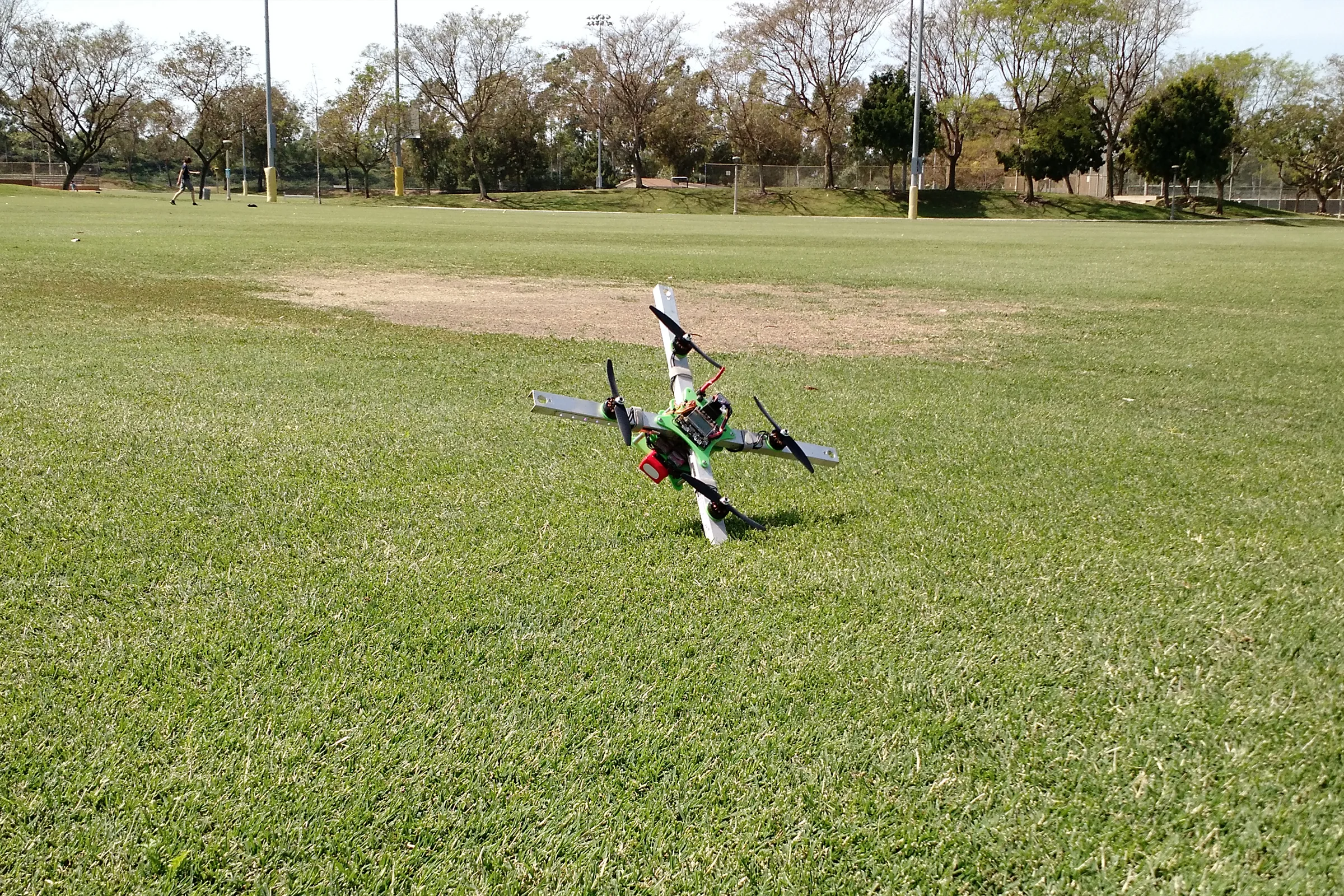 FPV Platforms and Goggle System — Drone 1 colored CAD render showing complete H-frame assembly with swing doors