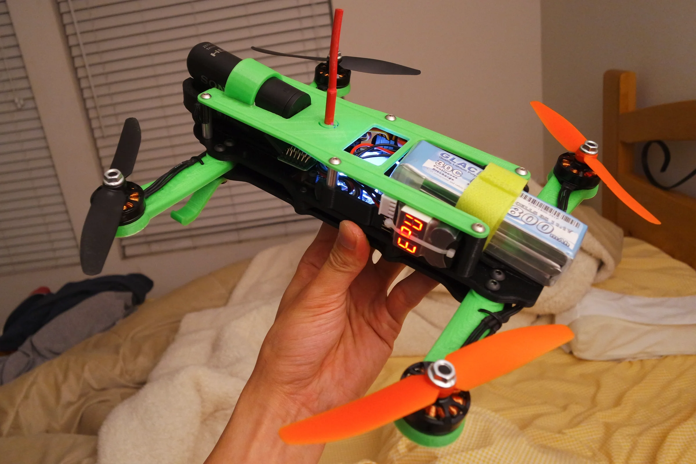 FPV Platforms and Goggle System — Drone 3 CAD showing integrated camera cutout and rear battery tilt for CG balance