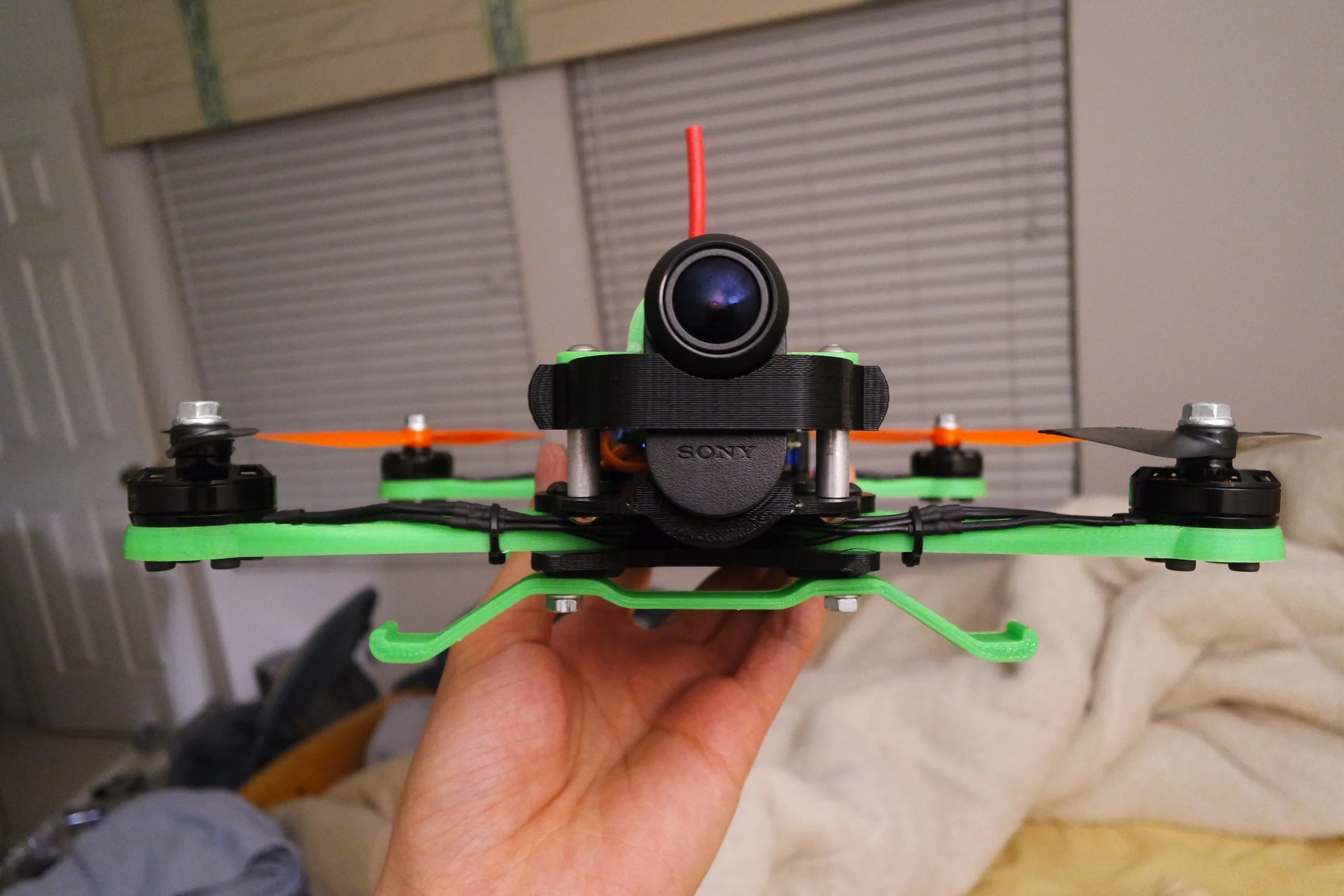FPV Platforms and Goggle System — Drone 3 green H-frame assembly with electronics before camera installation