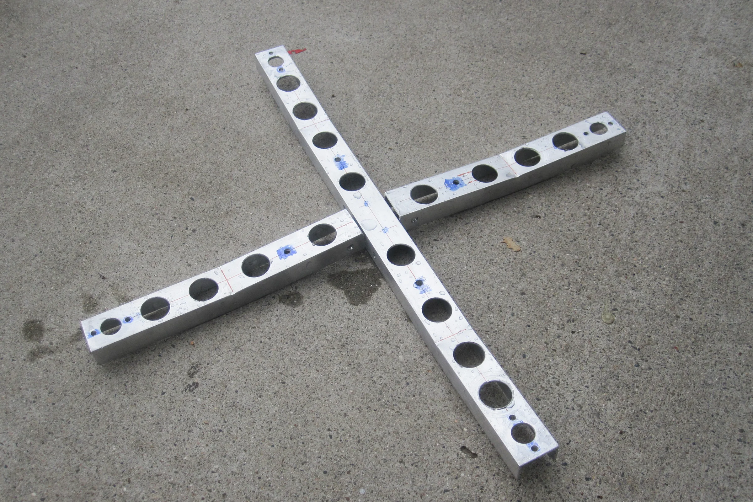 FPV Platforms and Goggle System — Drone 4 aluminum arms with circular holes drilled throughout for weight reduction