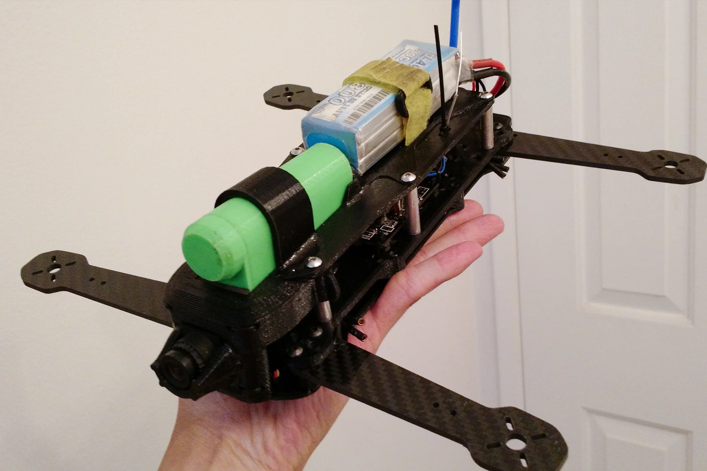 FPV Platforms and Goggle System — Drone 5 CAD showing H-frame with CF arms, low deck, and integrated FPV front clip