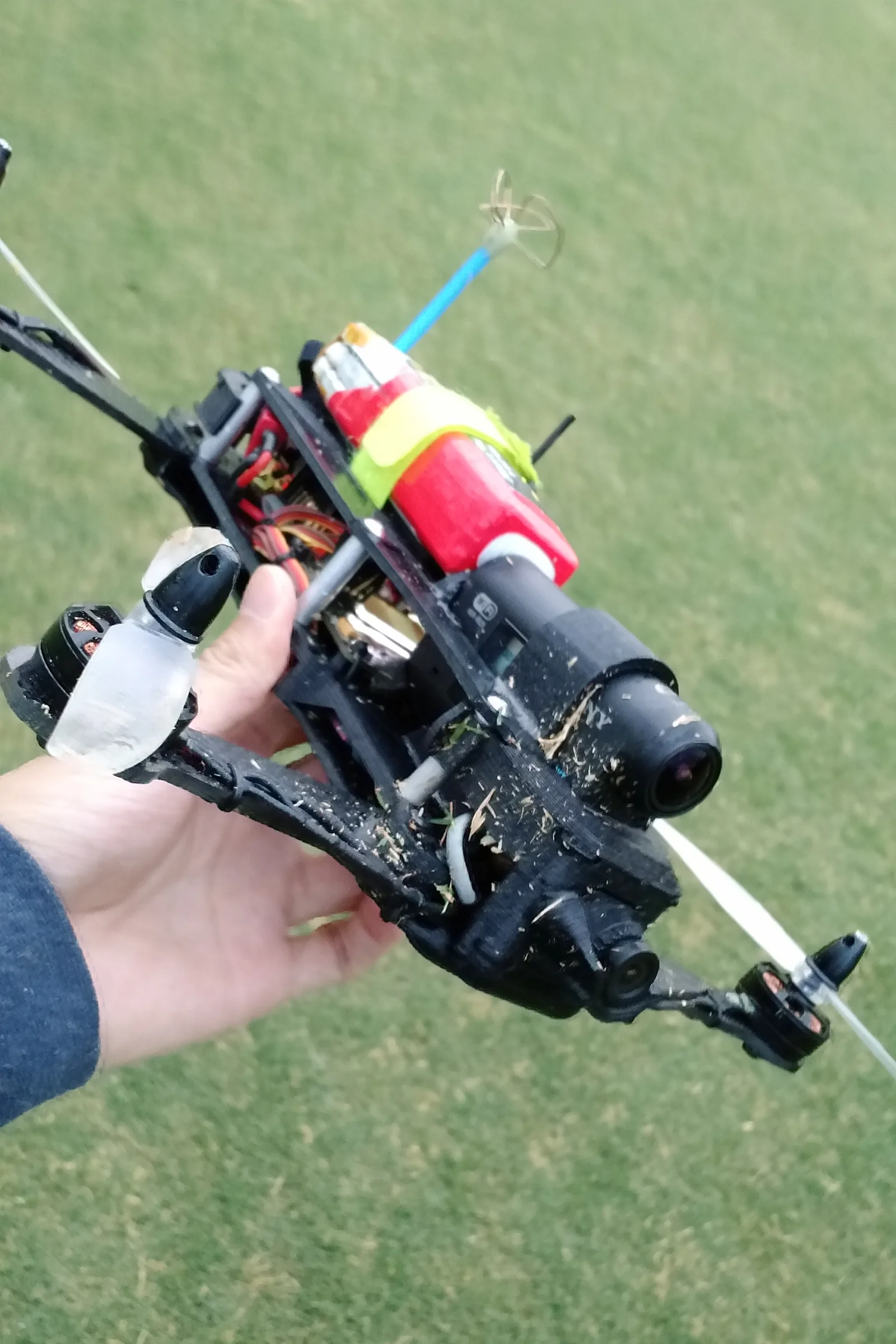 FPV Platforms and Goggle System — Drone 5 fully assembled with CF arms, integrated Actioncam, and FPV board cam in front retaining clip