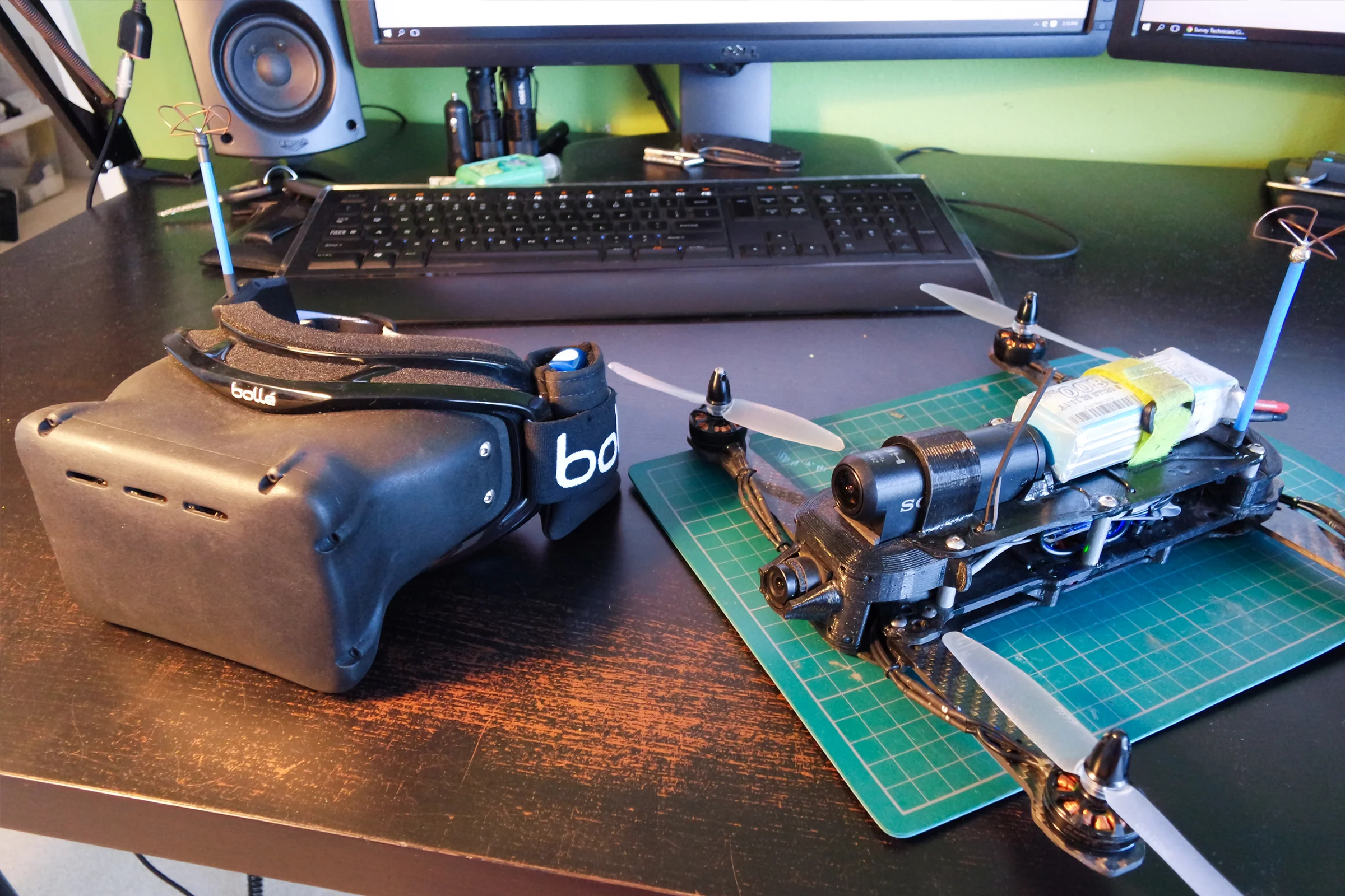 FPV Platforms and Goggle System — Drone 5 CAD showing H-frame with CF arms, low deck, and integrated FPV front clip