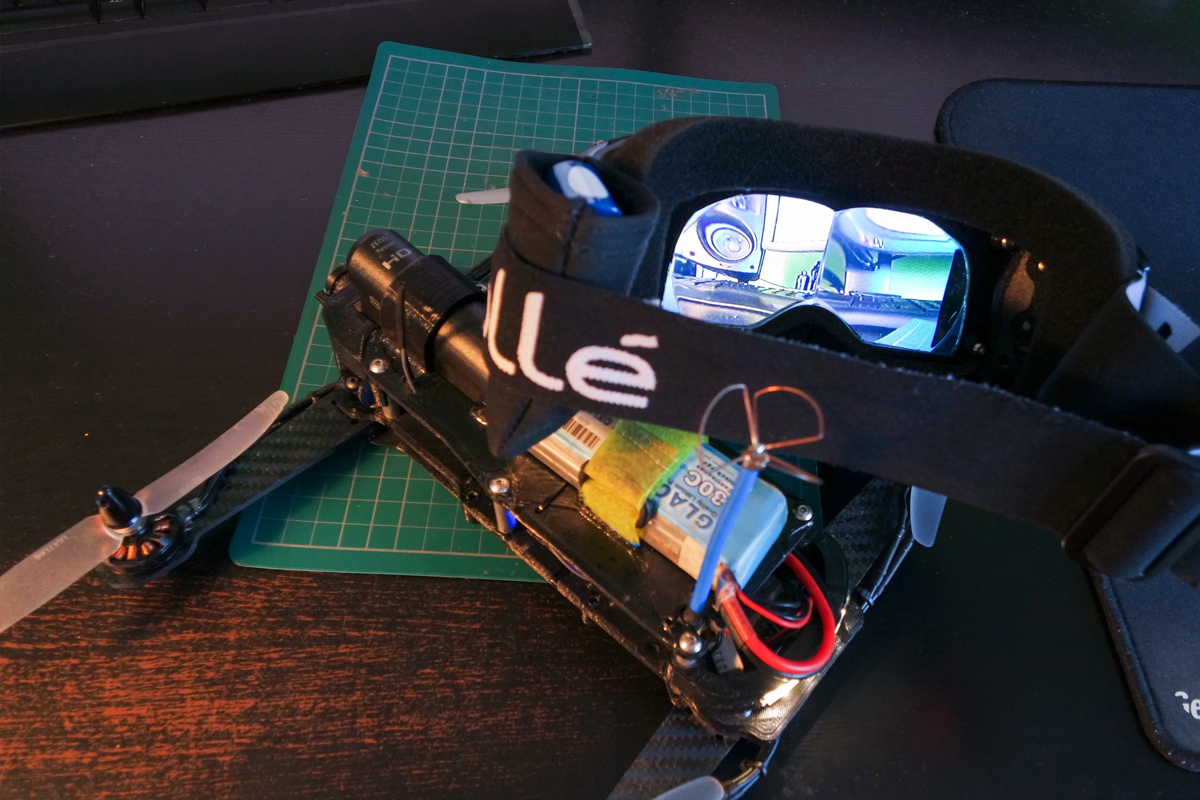 FPV Platforms and Goggle System — Drone 5 CAD showing H-frame with CF arms, low deck, and integrated FPV front clip