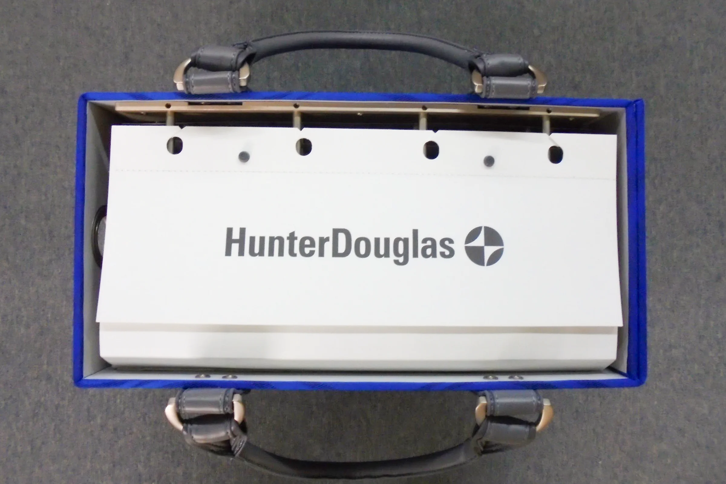 Hunter Douglas Rescue — Window cling stored flat on top of sample book alternative storage position