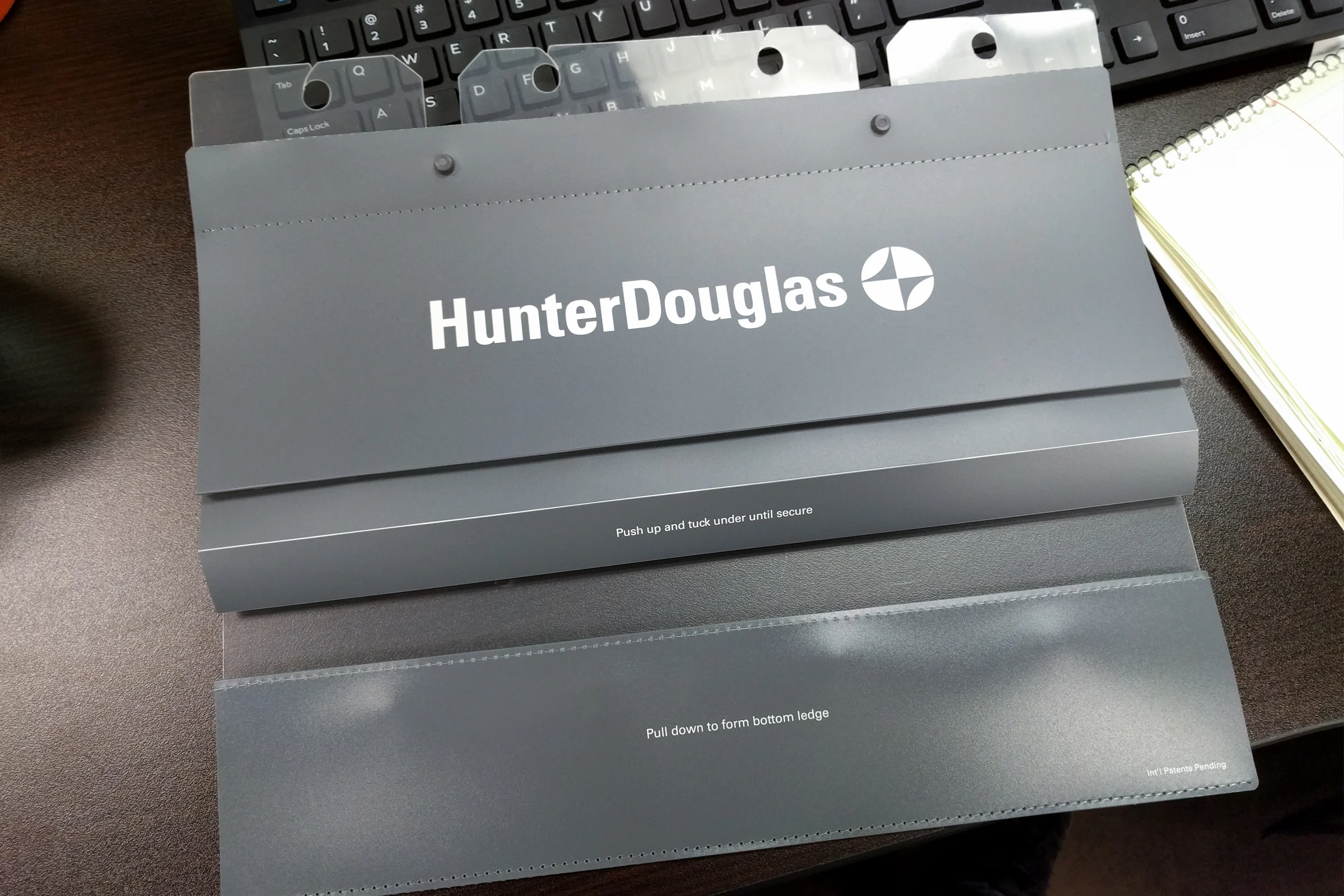 Hunter Douglas Rescue — Final production unit in collapsed position with book ring latch engaged