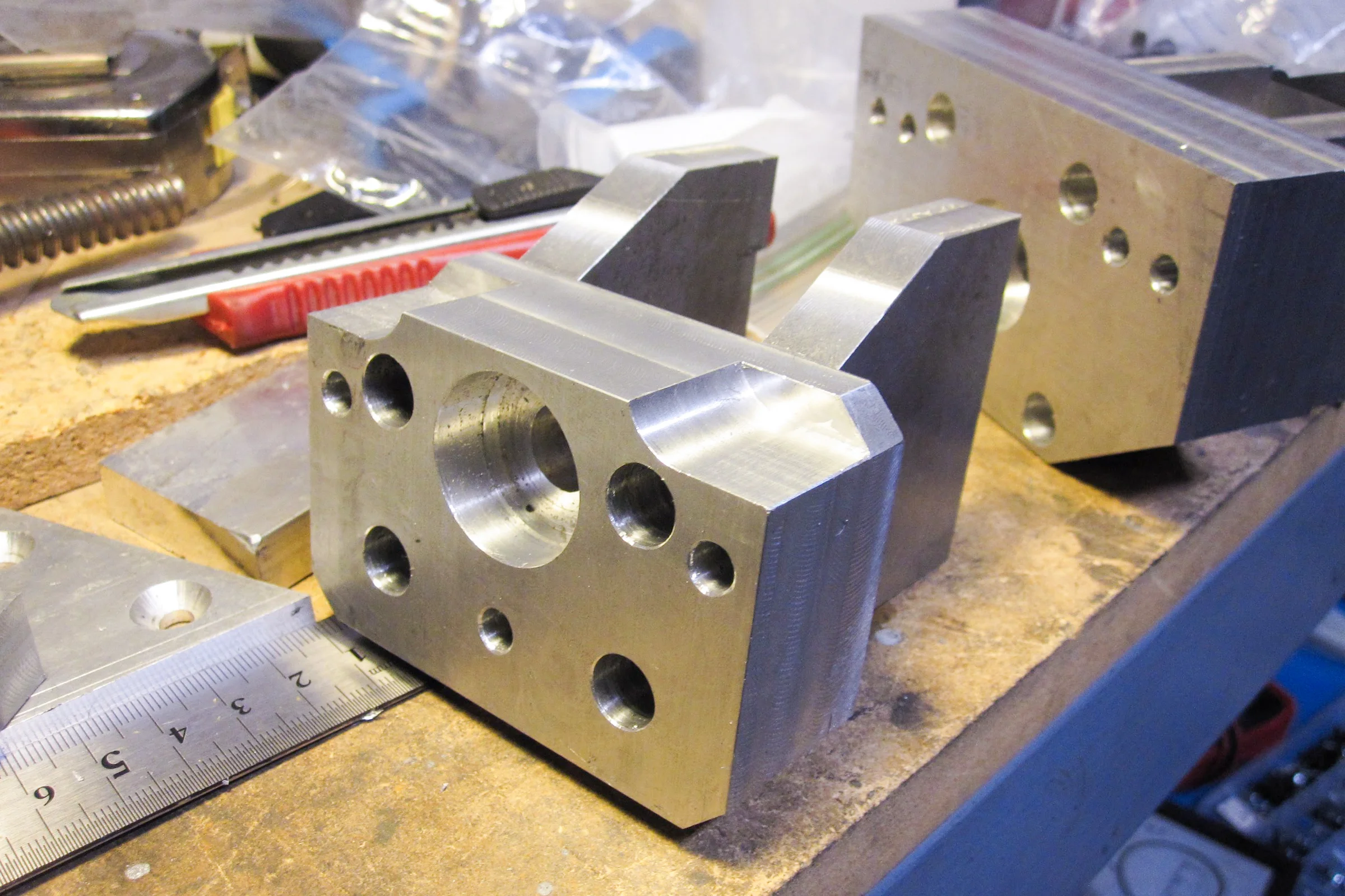 The Mill Trilogy — Finished CNC conversion components laid out for inspection before LMS mill teardown and assembly