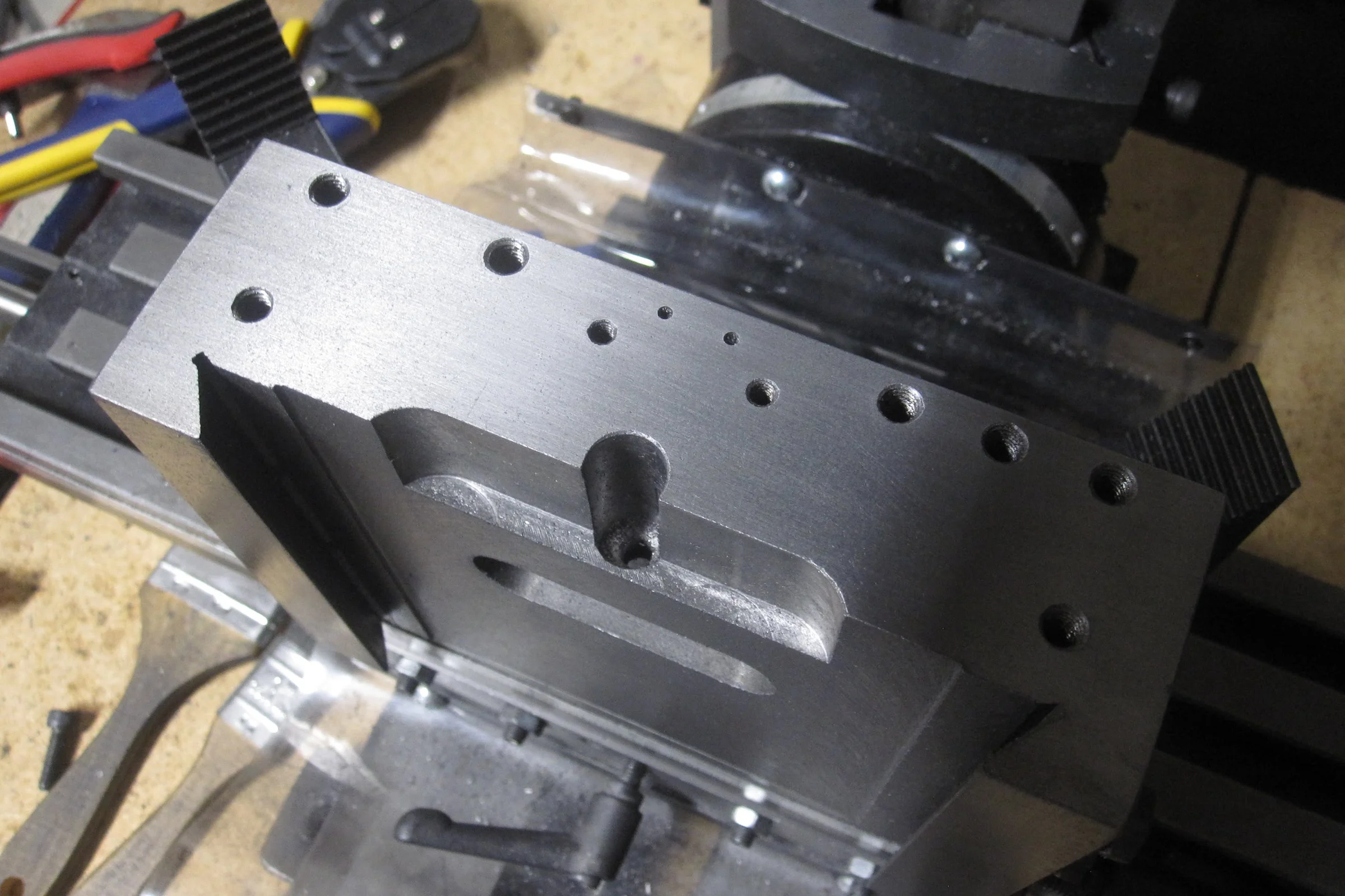 The Mill Trilogy — SolidWorks motor mount design referenced against LMS X2 casting geometry
