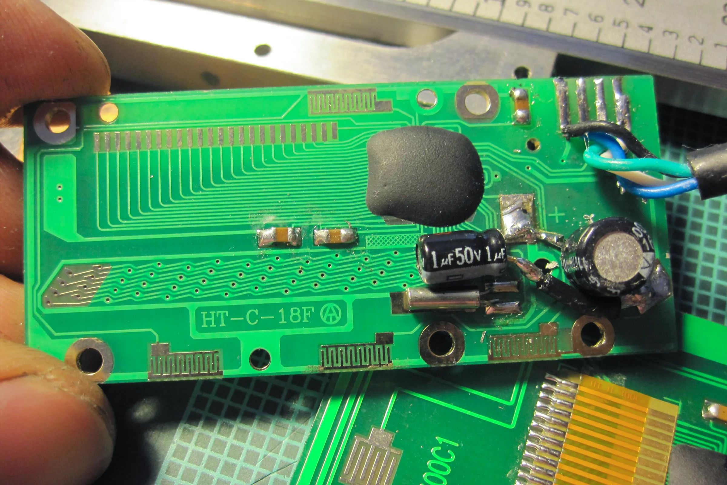 The Mill Trilogy — Digital caliper PCB stripped to minimum components for low-profile fitment inside milling table