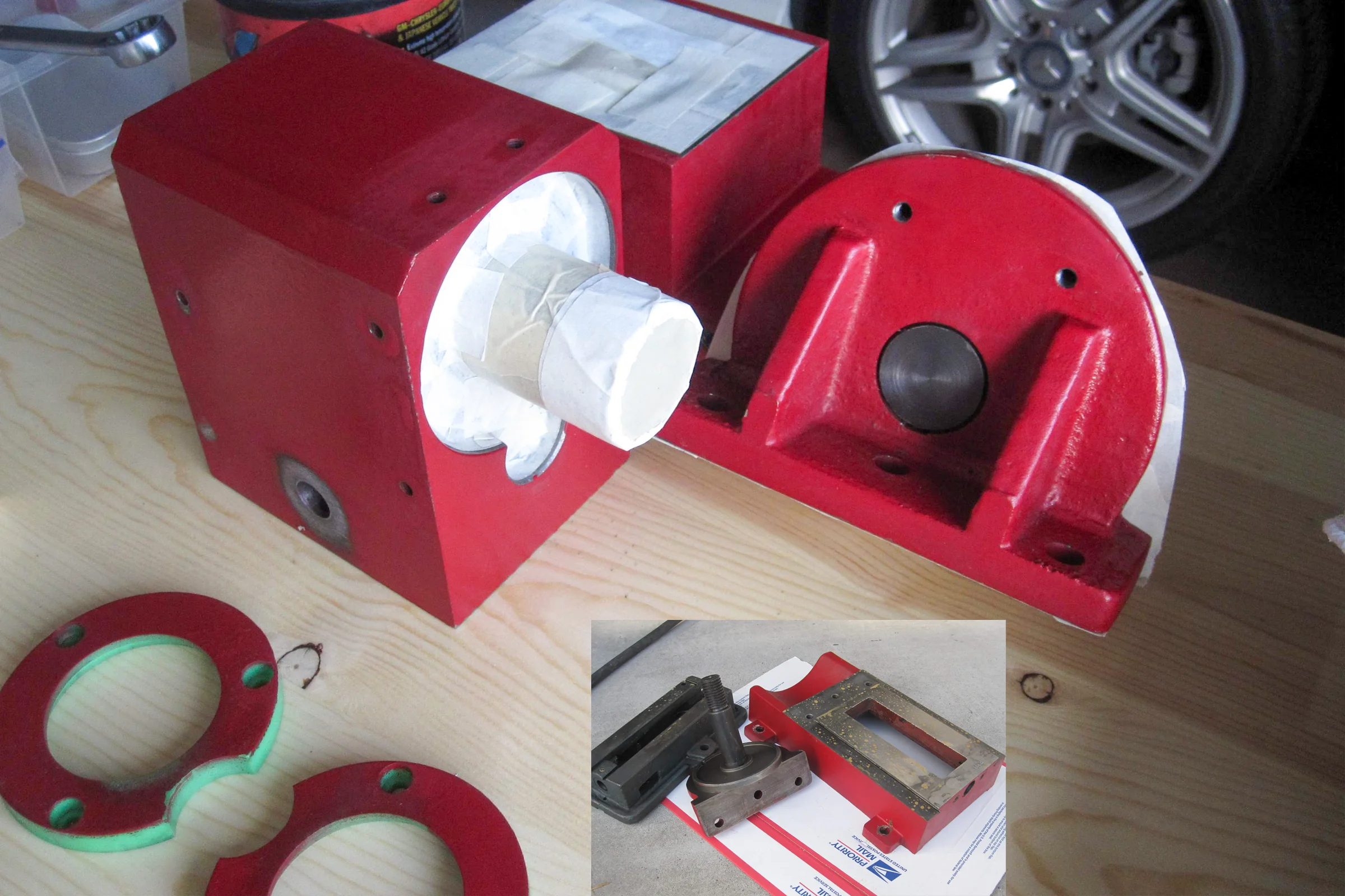 The Mill Trilogy — Powder coated mill components before final assembly, flat black finish on aluminum and cast iron parts