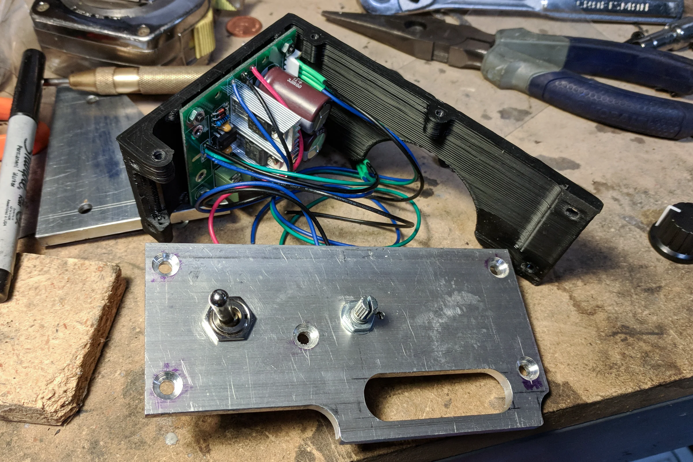 The Mill Trilogy — Power feed controller panel with integrated speed control and direction toggle, access panels built into original housing geometry