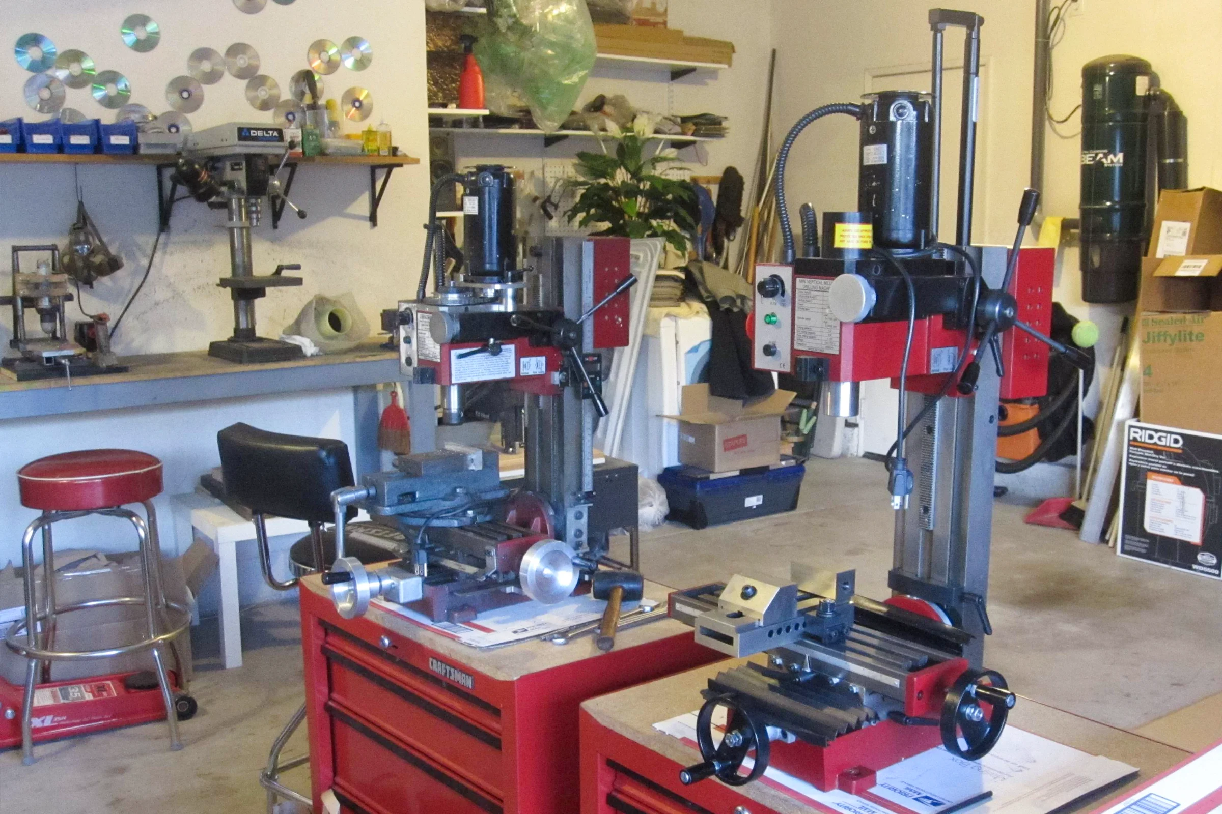The Mill Trilogy — Two used X2 mini mills on toolboxes, the starting point for the super mill and CNC conversion builds
