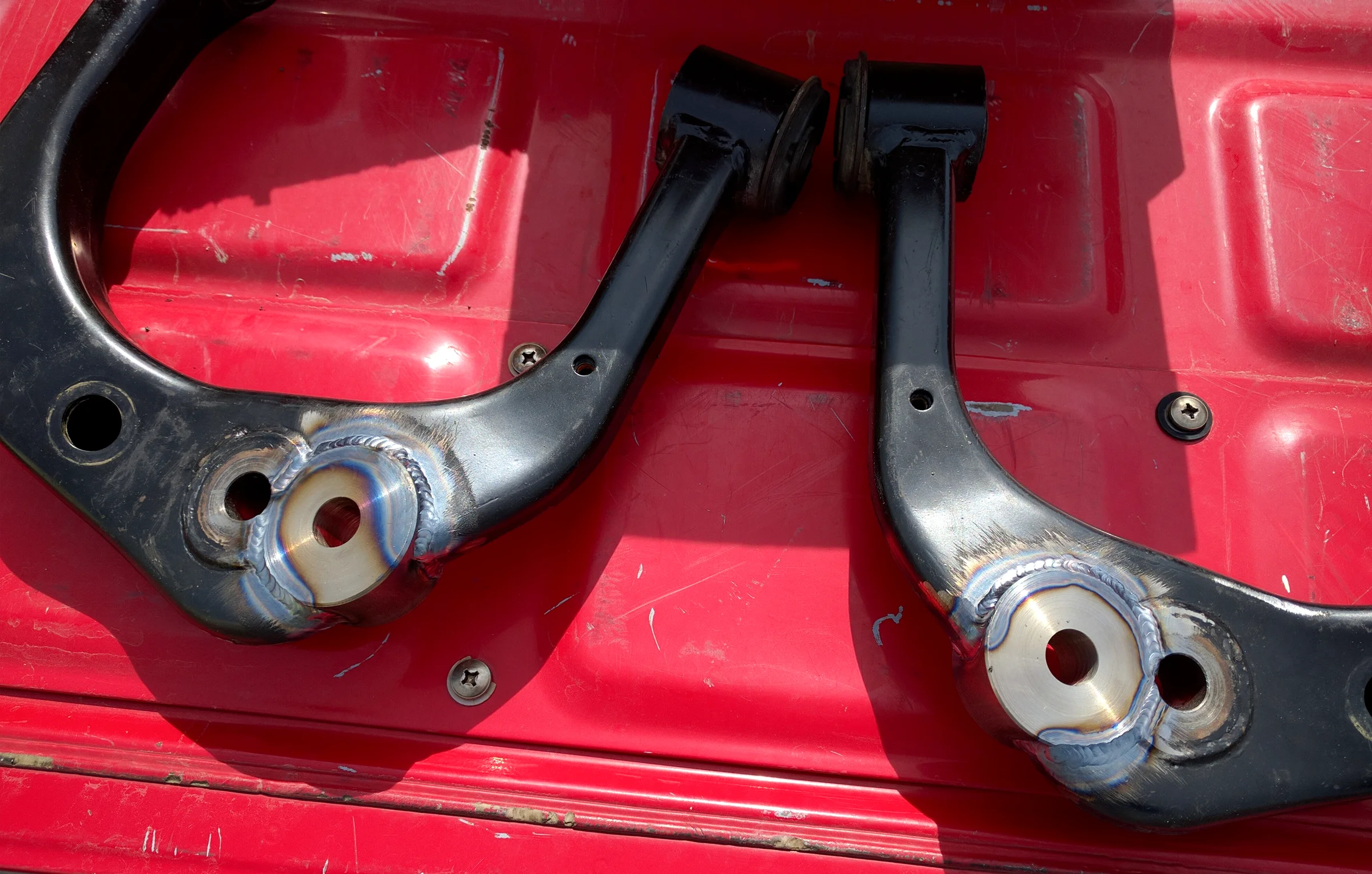 Suspension Geometry Correction — Lifted Toyota Tacoma with MT tires at final ride height after full suspension lift and geometry correction
