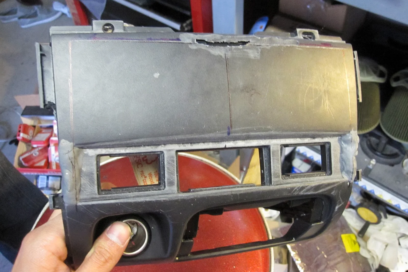 Vehicle Integrated Compute — Moto G phone disassembled with external button wiring and harness installed
