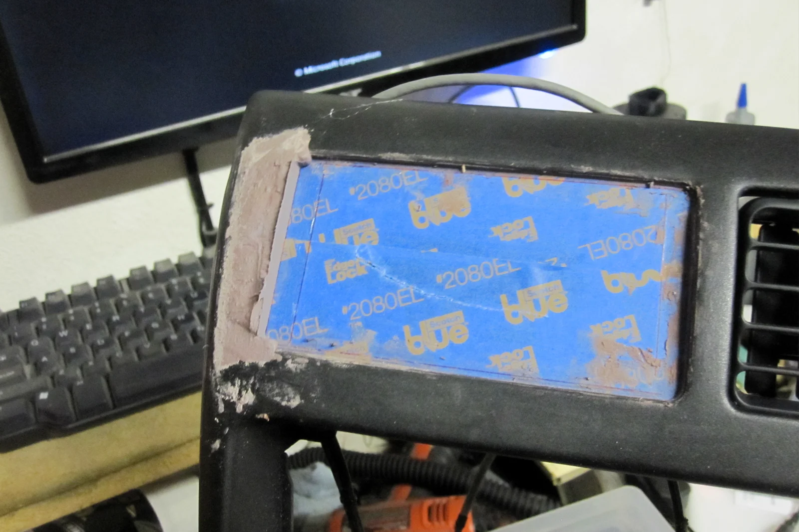 Vehicle Integrated Compute — Factory Tacoma head unit PCB showing ribbon cable audio signal intercept point