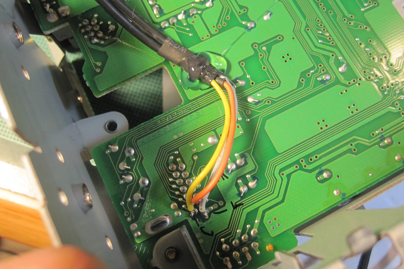 Vehicle Integrated Compute — Moto G phone disassembled with external button wiring and harness installed