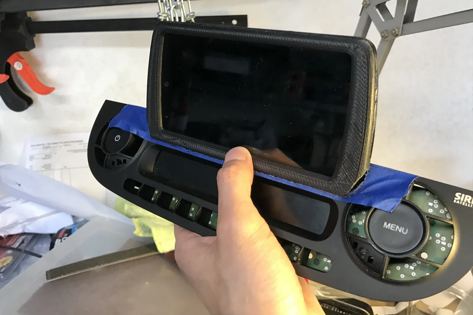 Vehicle Integrated Compute — Moto G phone disassembled with external button wiring and harness installed