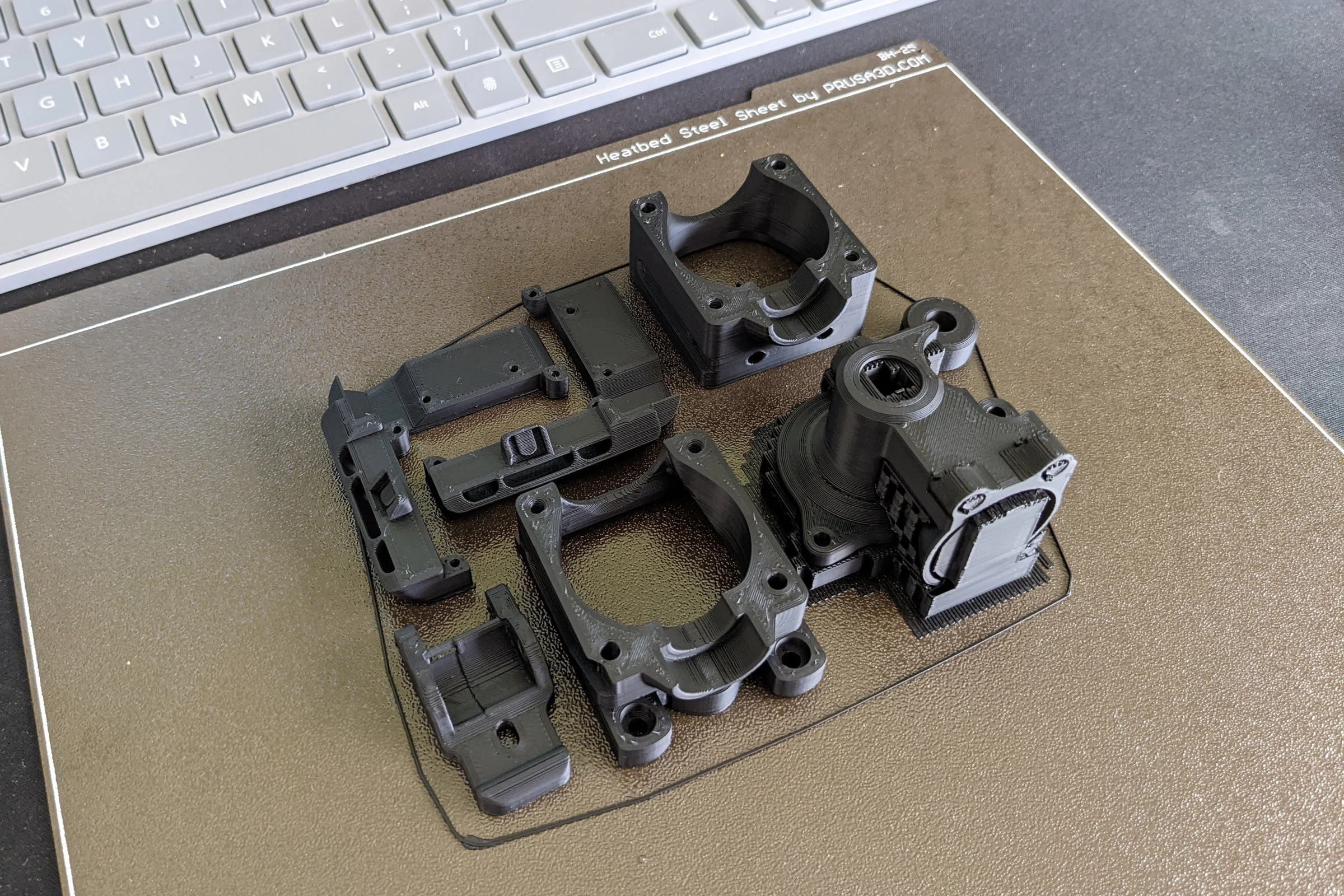 Voron Build — Orbiter extruder modified for 2.85mm filament with rearranged gear layout around fixed planetary hub